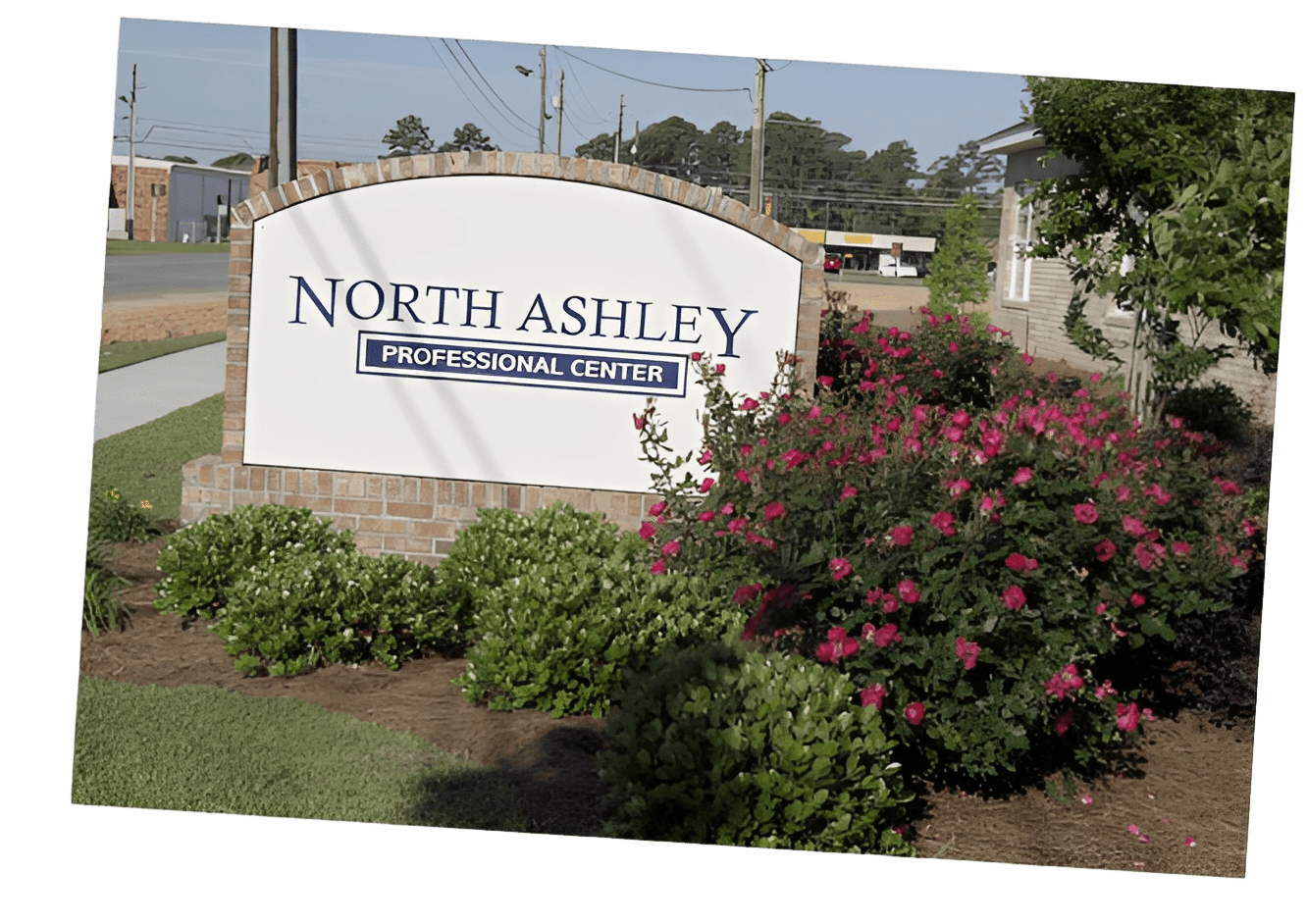 Business center sign and landscaping